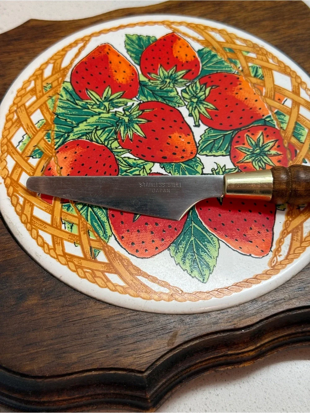 Vintage cheese board with matching knife.